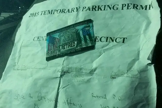 A "temporary parking permit" created by a retired police officer
